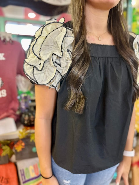 CC BLACK TOP WITH WHITE RUFFLE SLEEVES