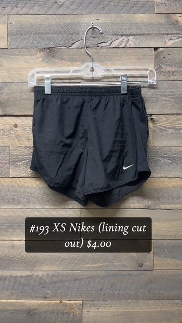 #193 XS Nikes (lining cut out)