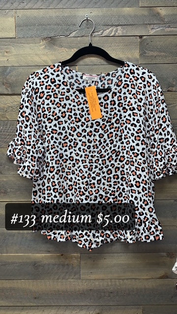 #133 MEDIUM LEO RUFFLE SLEEVED TOP
